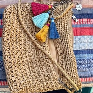 The Sak Tan Crochet Crossbody Bag with Multicolor Tassels